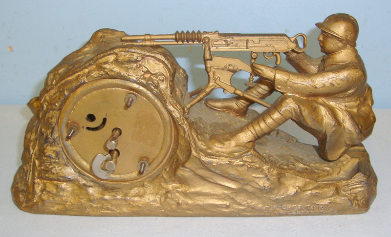  WW1 French E.Richer Editeur Paris Depose Trench Art Mantelpiece or Desk Clock Featuring A Model 1914 Hotchkiss Machine Gun Emplacement This is an attractive original pot metal trench art clock. The fully working clock with brass rimmed 2” glazed face is in working order and has its original winder. The clock is bolted into a well formed gilt finished pot metal trench combat scene depic Other Accessory