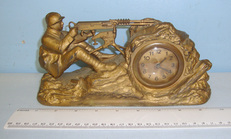 WW1 French E.Richer Editeur Paris Depose Trench Art Mantelpiece or Desk Clock Featuring A Model 1914 Hotchkiss Machine Gun Emplacement This is an attractive original pot metal trench art clock. The fully working clock with brass rimmed 2” glazed face is in working order and has its original winder. The clock is bolted into a well formed gilt finished pot metal trench combat scene depic Other Accessory