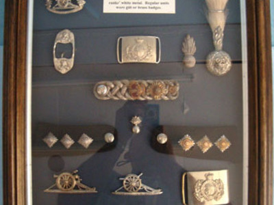 Volunteer Artillery' Badges And Insignia 1859-1908. A large frame of. 'Volunteer Artillery' Badges And Insignia 1859-1908.  Other Accessory