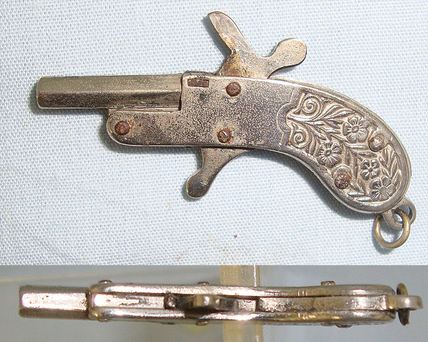  MINIATURE**EXPERTLY CRAFTED**Austrian Late 19th Century Break Action Pin Fire Metal Pistol With Foliate Decorated Grips. Sn 23564:4 miniature pistol Obsolete Single Shot