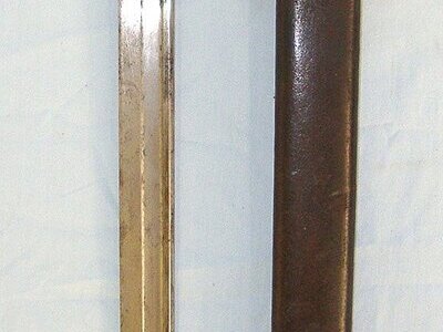 1st YEAR OF PRODUCTION**Pre WW1 1908 Dated British WD 1st Pattern Hook Quillon 1907 Pattern Sword Bayonet By Sanderson Regiment marked ‘MX’ To The Middlesex Regiment Matching Date 1st Pattern Scabbard & 1915 Dated 1914 Pattern Leather Frog. Sn 23632 Bayonet