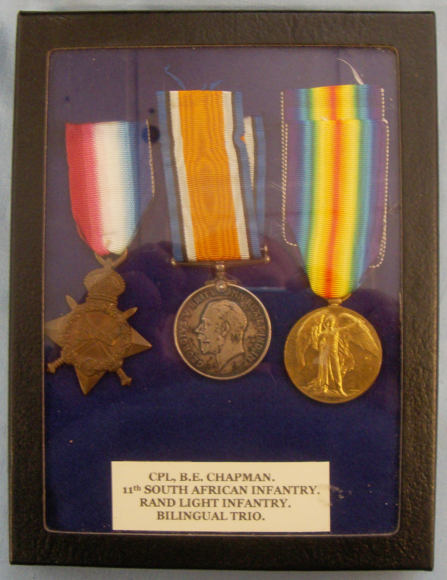  Bi-lingual WW1 Trio to Cpl B.E. Chapman 11th South African Infantry - Rand Light Infantry. Sn 7774. Bi-lingual WW1 Trio to Cpl B.E. Chapman 11th South African Infantry - Rand Light Infantry. Sn 7774. Antique & Militaria