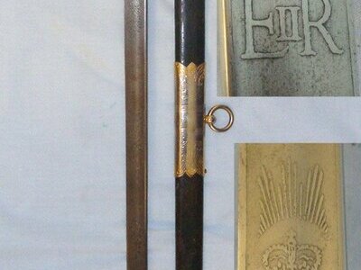 Post 1952 QE II British WD Pattern 1827 Wilkinson Sword Royal Navy Officer’s Sword With Etched Blade Bullion Cord, Portepee and Scabbard. Sn 22120 Sword