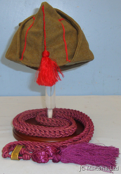  A Spanish garrison ( Gorrillo de Tropa ) Cap with Lanyard and Stand. HE 832. A Spanish garrison ( Gorrillo de Tropa ) Cap with Lanyard and Stand. HE 832. Clothing