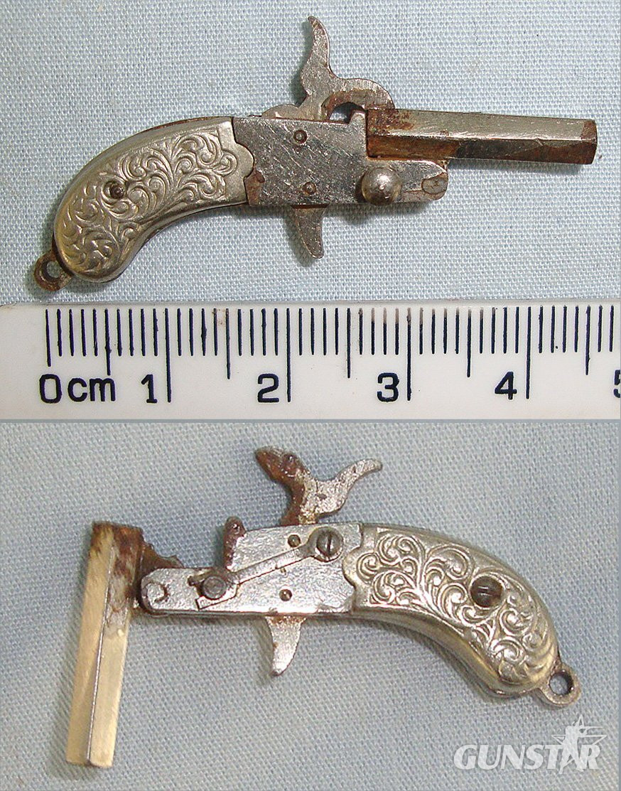 MINIATURE**EXPERTLY CRAFTED**Austrian Form Late 19th Century Break Action Pin Fire Metal Pistol With Foliate Decorated German Silver Grips. Sn 23564:5 miniature pistol Obsolete Single Shot in 