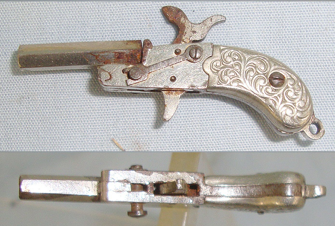  MINIATURE**EXPERTLY CRAFTED**Austrian Form Late 19th Century Break Action Pin Fire Metal Pistol With Foliate Decorated German Silver Grips. Sn 23564:5 miniature pistol Obsolete Single Shot