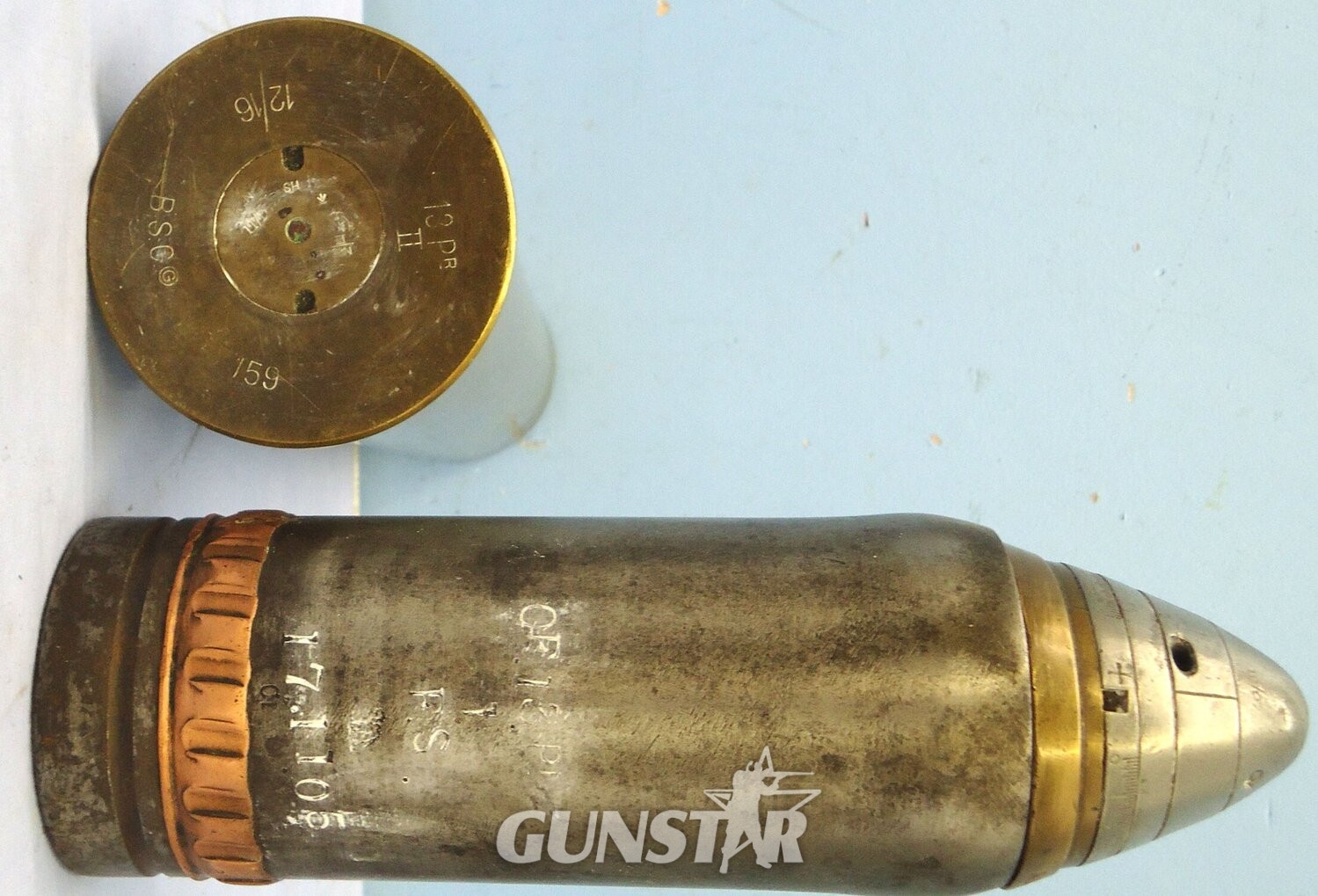 INERT DEACTIVATED. WW1 Era, 1910 Dated, British 13 Pounder (75x313R), Fired & Recovered Shrapnel Round Fitted With A No. 80 Mk II Time And Percussion Fuze. - O 2126 INERT DEACTIVATED. WW1 Era, 1910 Dated, British 13 Pounder (75x313R), Fired & Recovered Shrapnel Round Fitted With A No. 80 Mk II Time And Percussion Fuze. - O 2126  Other Ammunition - {CATEGORY}