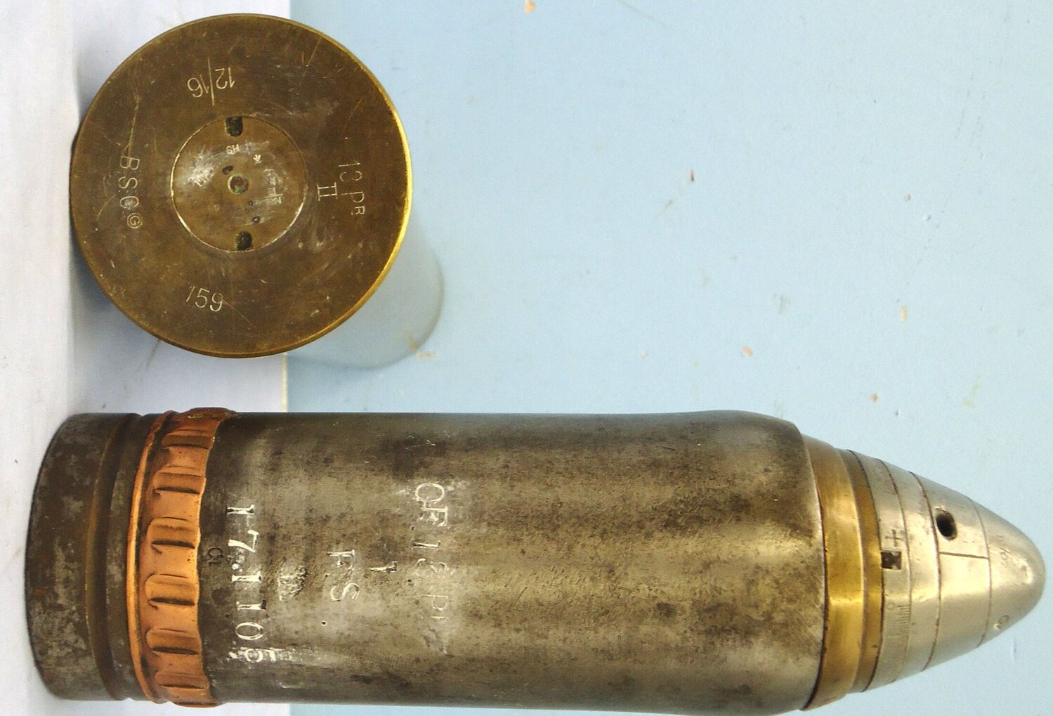 INERT DEACTIVATED. WW1 Era, 1910 Dated, British 13 Pounder (75x313R), Fired & Recovered Shrapnel Round Fitted With A No. 80 Mk II Time And Percussion Fuze. - O 2126 INERT DEACTIVATED. WW1 Era, 1910 Dated, British 13 Pounder (75x313R), Fired & Recovered Shrapnel Round Fitted With A No. 80 Mk II Time And Percussion Fuze. - O 2126  Other Ammunition - {CATEGORY}