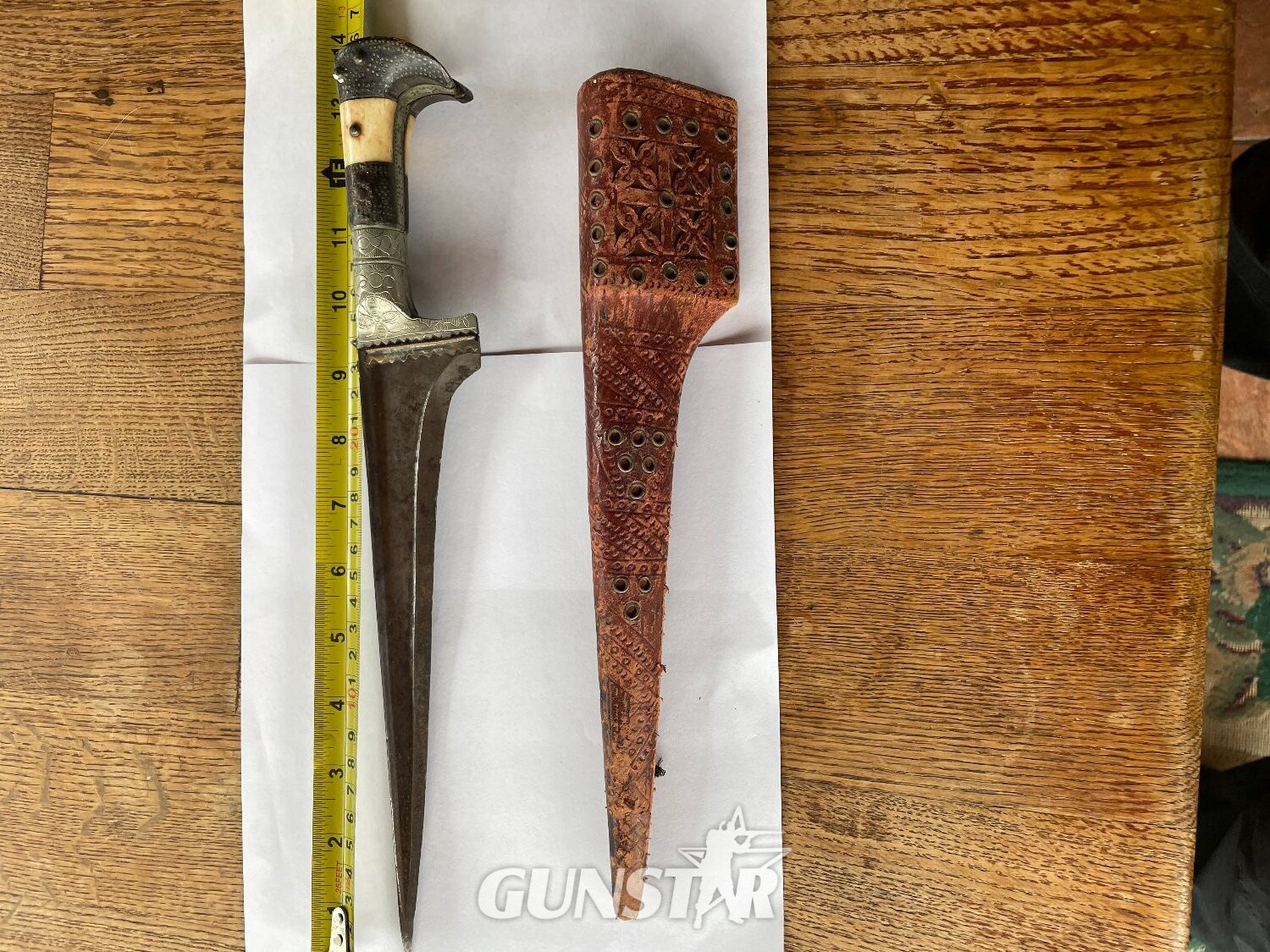 TRADITIONAL PASHTUN TRIBUTE KNIFE    YAK HORN AND BONE HANDLE    SILVER GUARD AND BUCKLE  TYPICAL T-SHAPED BLADE   TOTAL LENGTH: 35 CM  TRADITIONAL METAL AND LEATHER SHEATH Dagger in 