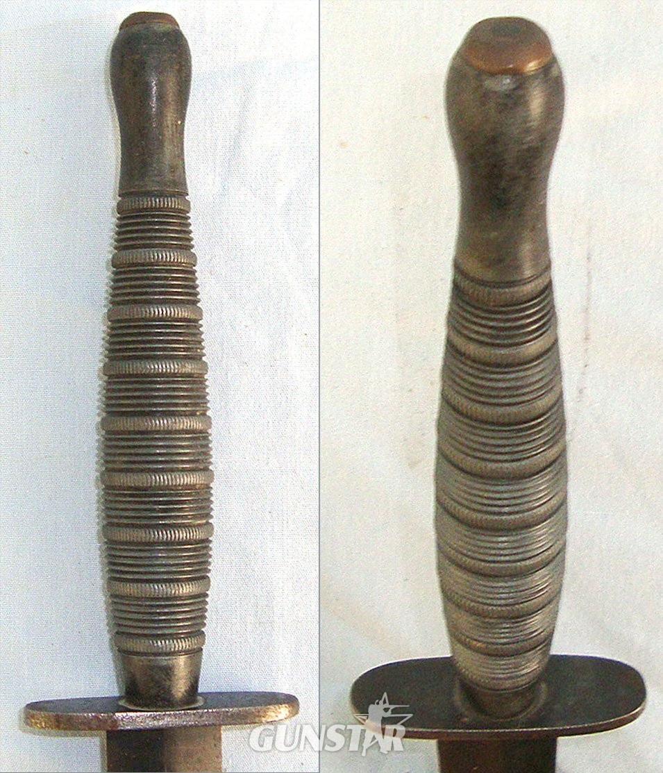 VERY RARE**9 ROPED RINGS VARIANT**WW2 British Officer’s Private Purchase Ribbed & Roped Alloy Hilt Fairbairn Sykes FS Commando Fighting Knife & Scabbard. Sn 23578 Knive