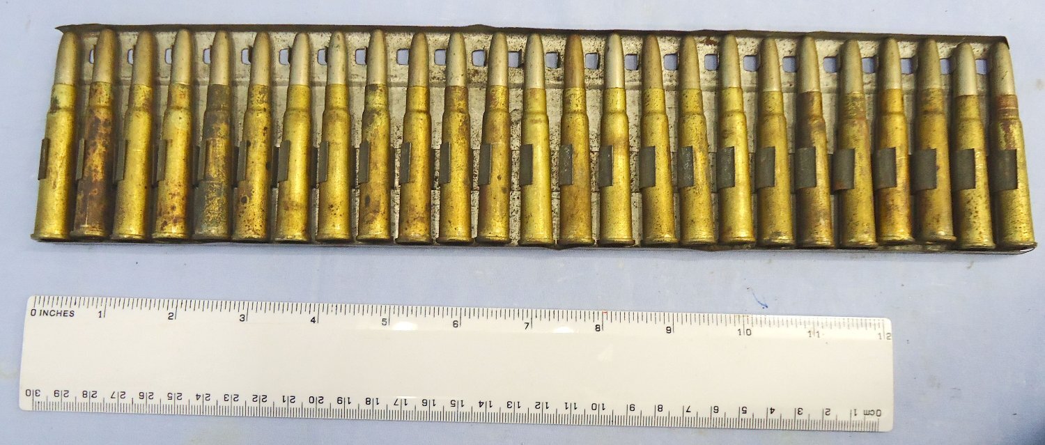 INERT DEACTIVATED. RARE, British, Experimental, 25 Round .303 Feed Strip for the British Model 1893 Gatling Gun. - O 2283 INERT DEACTIVATED. RARE, British, Experimental, 25 Round .303 Feed Strip for the British Model 1893 Gatling Gun. - O 2283 Various Other Ammunition - {CATEGORY} in 