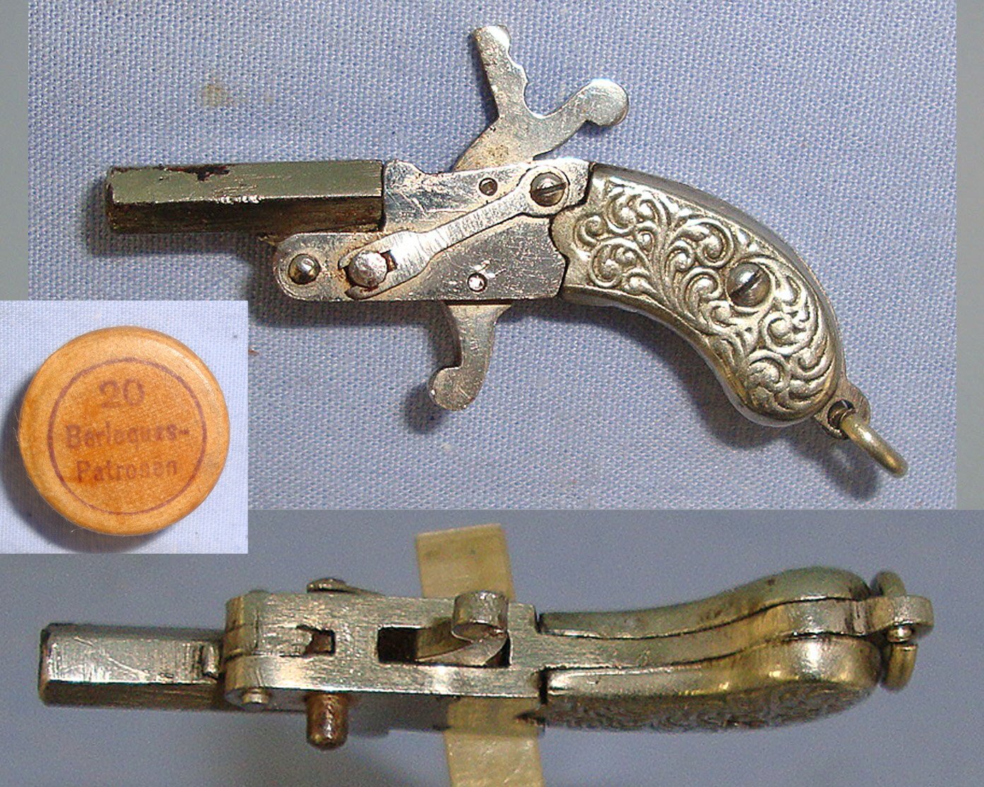 MINIATURE**EXPERTLY CRAFTED**German / Austrian Late 19th Century Break Action Pin Fire Metal Pistol With German Silver Grips & Period Ammunition Box Containing A Small Quantity Of 1mm Pin Fire Blank Cartridges. Sn 23708:2  miniature pin fire pistol  Obsolete Single Shot