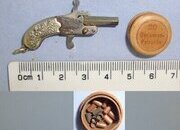 MINIATURE**EXPERTLY CRAFTED**German / Austrian Late 19th Century Break Action Pin Fire Metal Pistol With German Silver Grips & Period Ammunition Box Containing A Small Quantity Of 1mm Pin Fire Blank Cartridges. Sn 23708:2  miniature pin fire pistol  Obsolete Single Shot