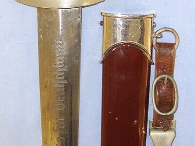 EARLY PRODUCTION**Nazi German 1933 Pattern SA Dagger With Etched Blade By Puma Solingen (Rarity Value 6), To ‘Wm’ SA Group Westmark (Saarbrucken), Scabbard & Hanger With Assman DRGM Marked Clasp. Sn 23484:108 Dagger