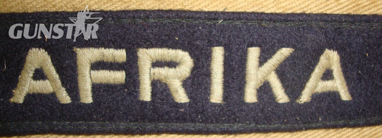 WAR TROPHY ** TAKEN FROM GERMAN POW 1943 AT ENFIDAVILLE NORTH AFRICA BY BRITISH PTE A. HARRIS GREEN HOWARDS GUARD** WW2 DAK (Deutsches Afrikakorps) Cuff Title Attached To Piece Of Original German Tropical Uniform Sleeve. Sn 23068:2  Antique & Militaria