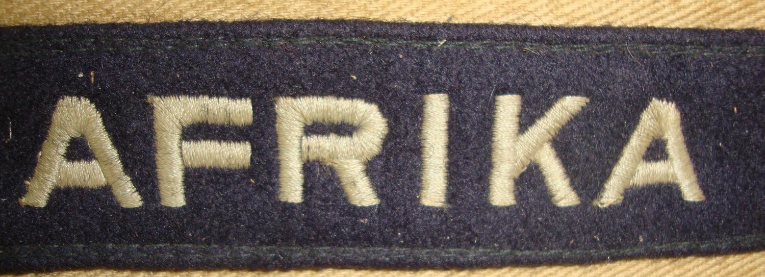 WAR TROPHY ** TAKEN FROM GERMAN POW 1943 AT ENFIDAVILLE NORTH AFRICA BY BRITISH PTE A. HARRIS GREEN HOWARDS GUARD** WW2 DAK (Deutsches Afrikakorps) Cuff Title Attached To Piece Of Original German Tropical Uniform Sleeve. Sn 23068:2  Antique & Militaria