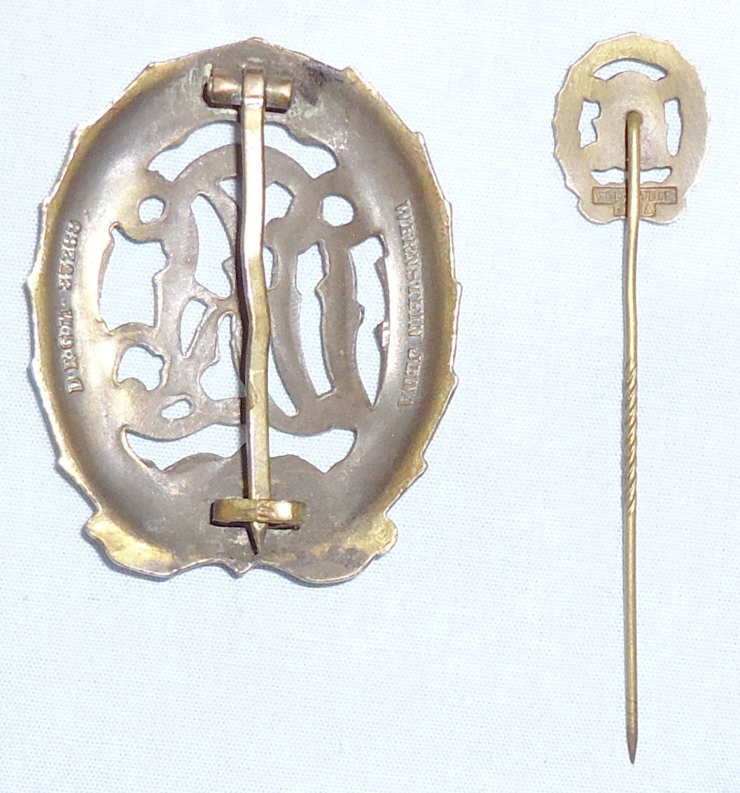  Matching* Original German WWII D.R.L. Sports Bronze Badge maker marked “Wernstein, Jena” and Matching Pin. N 183. Matching* Original German WWII D.R.L. Sports Bronze Badge maker marked “Wernstein, Jena” and Matching Pin. N 183. Antique & Militaria