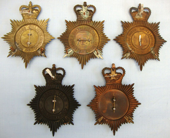 Various Various Queen's Crown Blackened Two Piece Helmet Plates. Other Accessory