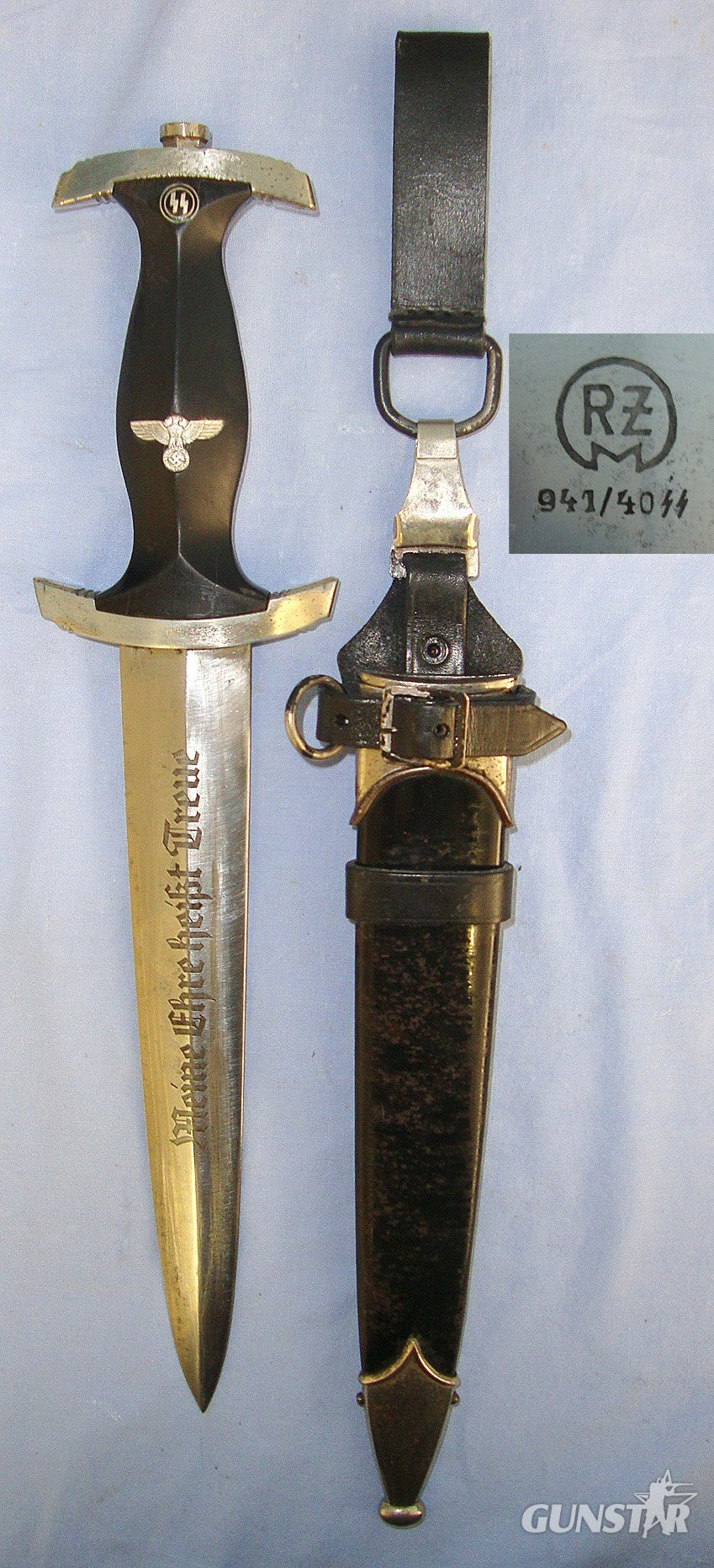 RARE**Wartime Production Early WW2 1940 Dated Nazi German 1933 Pattern SS Man’s Dagger By RZM 941 (Carl Eickhorn Solingen) With SS Runes & "Meine Ehre Heisst Treue" Motto Etched Blade, Scabbard & Assman DRGM Hanger Assembly. Sn 23484:109 Dagger in 
