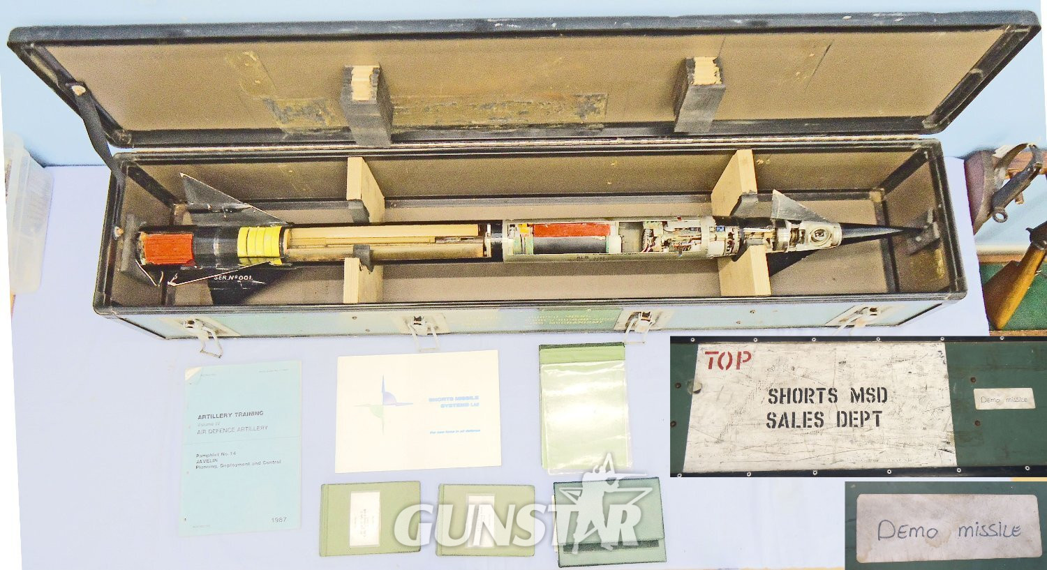 DEACTIVATED INERT. British, Shorts Missile Systems of Belfast, Javelin, FACTORY SECTIONED, Surface to Air Missile Serial Number 001, 1982 Dated, in Transit Container With Paperwork. Sn - 22650 DEACTIVATED INERT. British, Shorts Missile Systems of Belfast, Javelin, FACTORY SECTIONED, Surface to Air Missile Serial Number 001, 1982 Dated, in Transit Container With Paperwork. Sn - 22650  Other Ammunition - {CATEGORY} in 