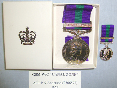 British Suez Crisis General Service Medal With Canal Zone Clasp Ribbon & Box Of Issue To ‘AC1 PN Anderson (2506577) RAF’ Together With A Miniature GSM With Canal Zone Clasp. British Suez Crisis General Service Medal With Canal Zone Clasp Ribbon & Box Of Issue To ‘AC1 PN Anderson (2506577) RAF’ Together With A Miniature GSM With Canal Zone Clasp. Other Accessory