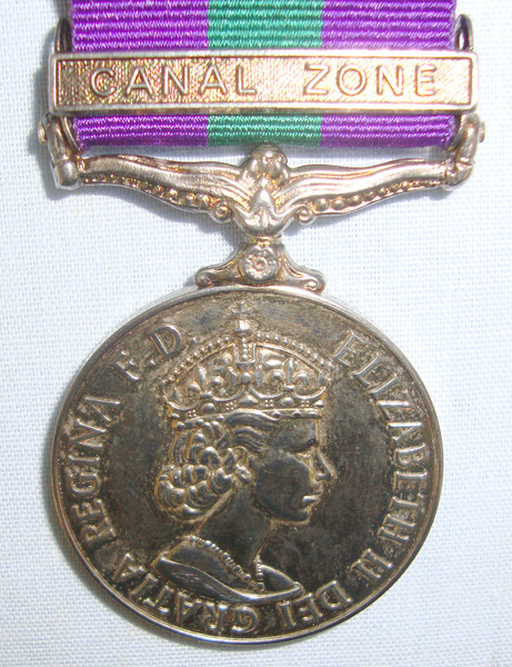 British Suez Crisis General Service Medal With Canal Zone Clasp Ribbon & Box Of Issue To ‘AC1 PN Anderson (2506577) RAF’ Together With A Miniature GSM With Canal Zone Clasp. British Suez Crisis General Service Medal With Canal Zone Clasp Ribbon & Box Of Issue To ‘AC1 PN Anderson (2506577) RAF’ Together With A Miniature GSM With Canal Zone Clasp. Other Accessory