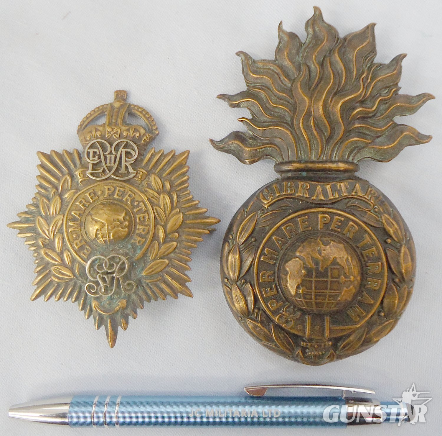 Pair* Royal Marines Portsmouth Queens Crown with Gilding Royal Cyphers and Royal Marines Artillery Cap Badges. 22434:6 . Pair* Royal Marines Portsmouth Queens Crown with Gilding Royal Cyphers and Royal Marines Artillery Cap Badges. 22434:6 .  Antique & Militaria