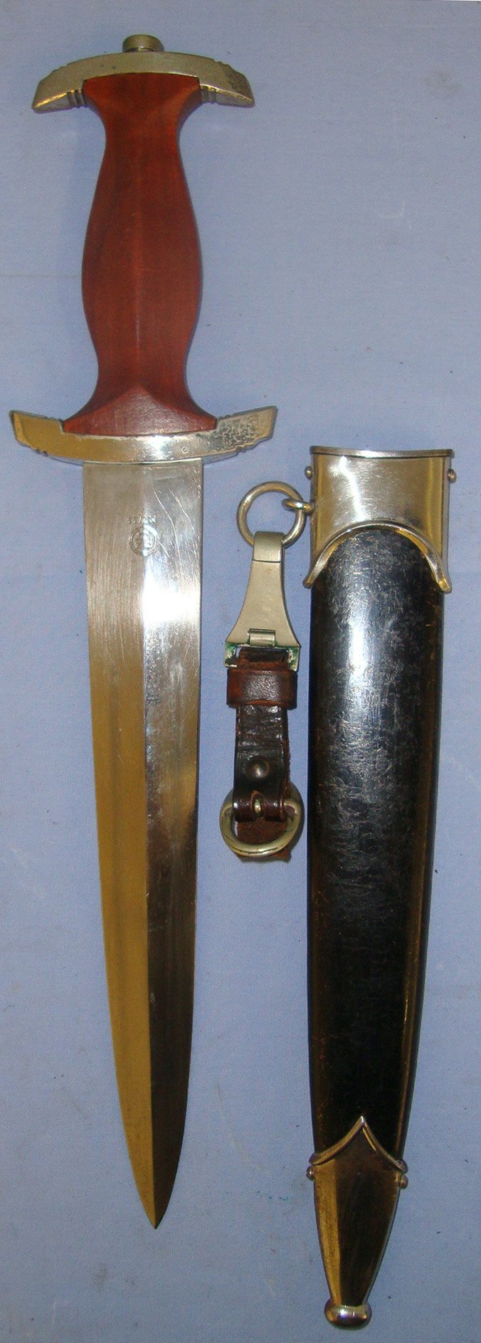  WW2 Production Nazi German 1933 Pattern NSKK Dagger By RZM M7 / 33 (F W. Holler, Solingen), Motto Etched Blade & Scabbard With Belt Hanger. Sn 21419 Dagger