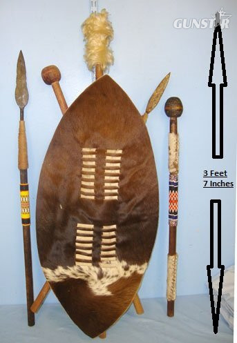 Early 20th Century Hand Crafted Tribal Tourist Piece Zulu Warrior’s Ingubha (Cow Hide) Umbumbuluzo Small War Shield With Removable Staff, Assegai Stabbing Spear & Knobkerry War Club Also Additional Assegai & Knobkerrie With Decorative Bead Work - 17840: Early 20th Century Hand Crafted Tribal Tourist Piece Zulu Warrior’s Ingubha (Cow Hide) Umbumbuluzo Small War Shield With Removable Staff, Assegai Stabbing Spear & Knobkerry War Club Also Additional Assegai & Knobkerrie With Decorative Bead Work - 17840: Other Accessory in 