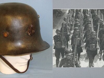 SCARCE** Irish Free State Army \'Coal Scuttle\' Model 1927 Combat Helmet By Vickers Ltd Number 495 Of Only 10,021 With Original Modified Officer’s Badge, Liner & Chin Strap. HE 850  Antique & Militaria