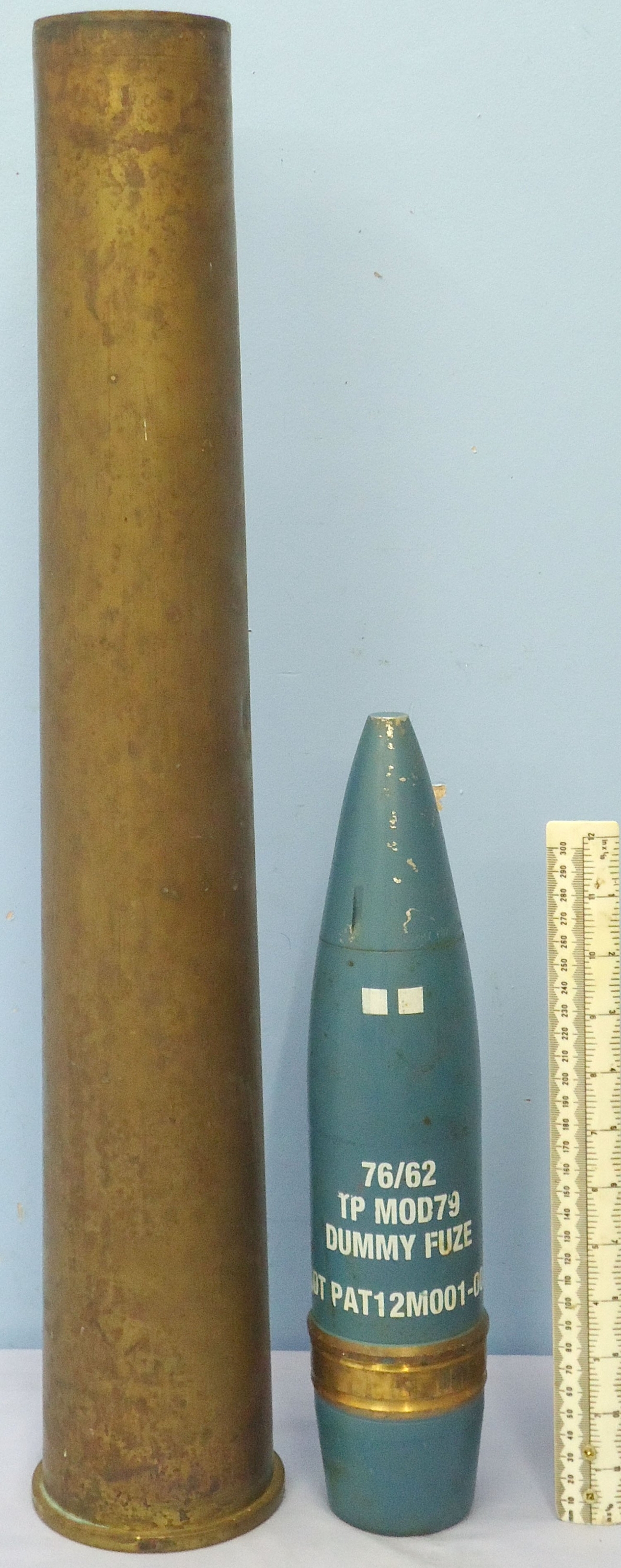 DEACTIVATED INERT. Unfired 76mm Oto Melara (76x636R) Practice High Explosive Round. - O 2303 DEACTIVATED INERT. Unfired 76mm Oto Melara (76x636R) Practice High Explosive Round. - O 2303 Various Other Ammunition - {CATEGORY}