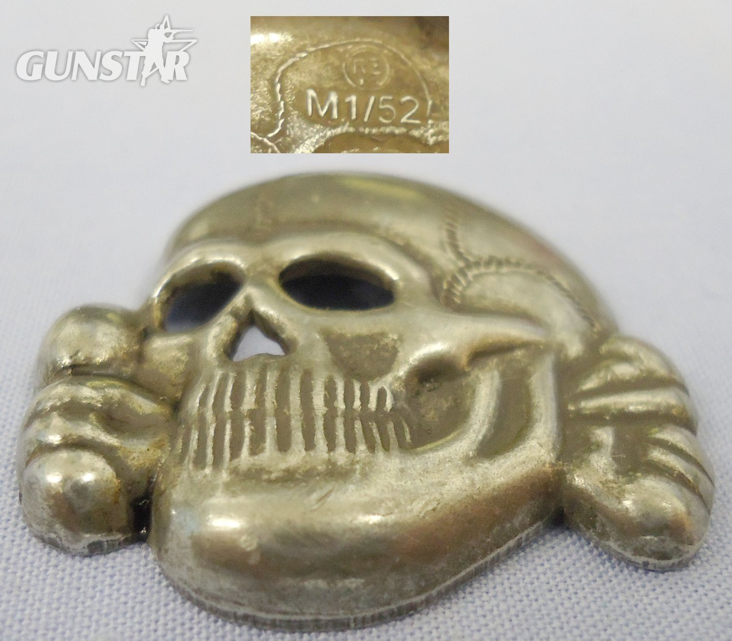Original WWII German M1/52 SS Visor Cap Skull by Deschler & Sohn, Munich. N 114. Original WWII German M1/52 SS Visor Cap Skull by Deschler & Sohn, Munich. N 114.  Antique & Militaria