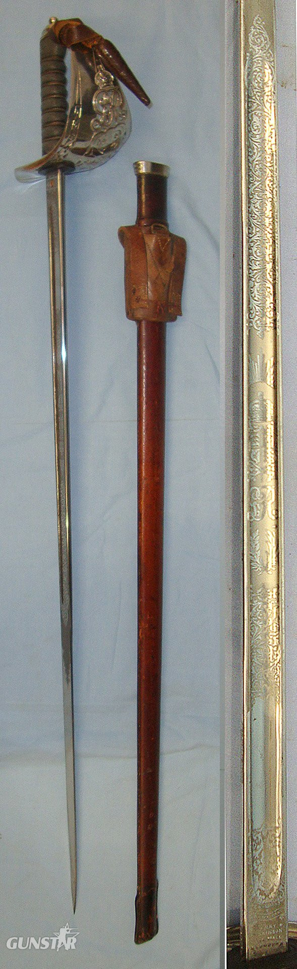  WW1 Era British WD 1897 Pattern Henry Wilkinson London Infantry Officer’s Sword With King George V Guard, Etched Blade Number 45529, Leather Officer’s Cord & Acorn Knot Leather Covered Field Service Scabbard & Sam Browne Leather Frog Without Long Stra Sword