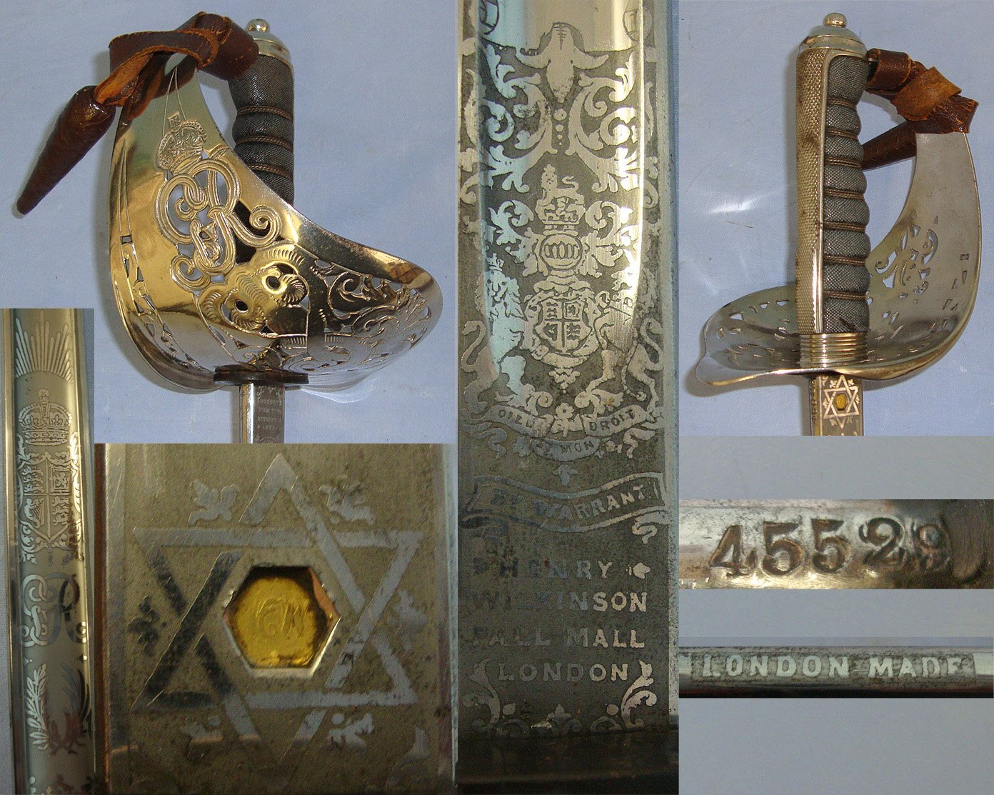 WW1 Era British WD 1897 Pattern Henry Wilkinson London Infantry Officer’s Sword With King George V Guard, Etched Blade Number 45529, Leather Officer’s Cord & Acorn Knot Leather Covered Field Service Scabbard & Sam Browne Leather Frog Without Long Stra Sword