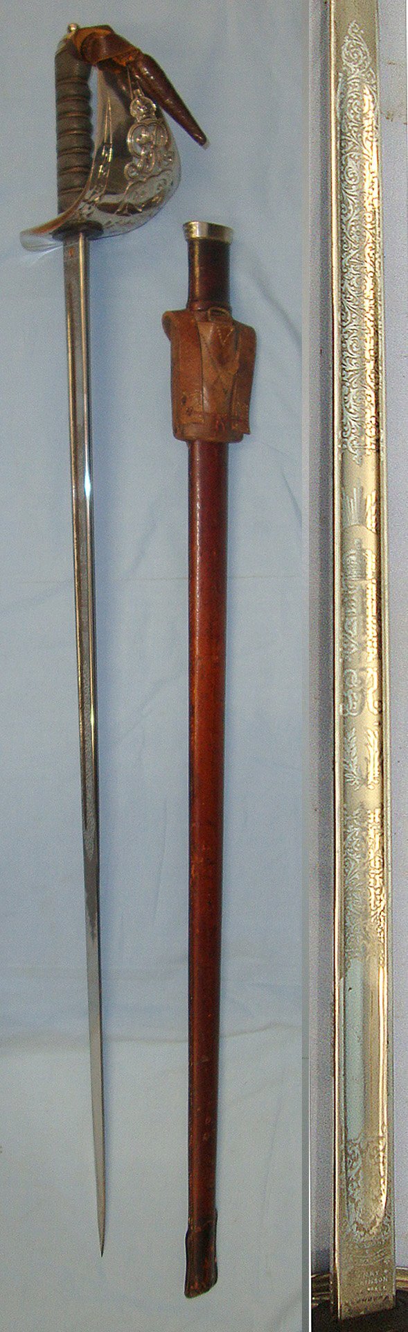  WW1 Era British WD 1897 Pattern Henry Wilkinson London Infantry Officer’s Sword With King George V Guard, Etched Blade Number 45529, Leather Officer’s Cord & Acorn Knot Leather Covered Field Service Scabbard & Sam Browne Leather Frog Without Long Stra Sword