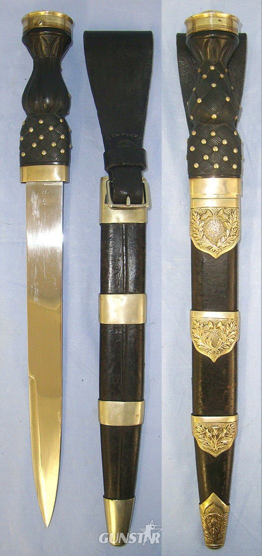  LARGE**Inter War 1937 Wilkinson Sword Pall Mall (London) British WD Scottish Highland Regiments Other Ranks German Silver Mounted Dirk With King’s Crown Pommel Cap & WD Scabbard With Leather Belt Hanger. Sn 23484:111 Knive