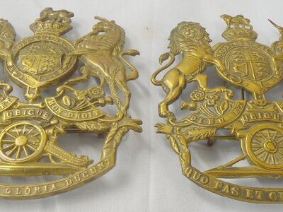 Pair* British Army Royal Artillery Kings Crown Helmet Plates One is c1878-1902 & the Other is c1902-1952. 22434:14. Pair* British Army Royal Artillery Kings Crown Helmet Plates One is c1878-1902 & the Other is c1902-1952. 22434:14.  Antique & Militaria