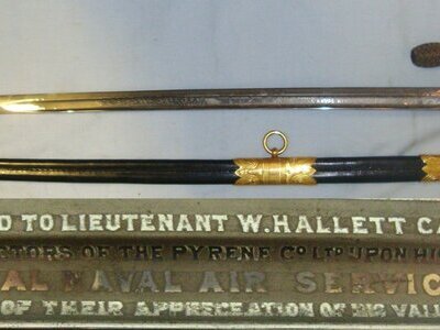RARE**ATTRIBUTED RNAS PILOT OFFICER’S**MINT**WW1 Era British Kings Crown Henry Wilkinson Sword With Blued & Etched Panels Blade Presented To Captain (Later RAF) William Hallett-Carpenter, Bullion Cord, Portepee & Matching Maker Scabbard. Sn 22088 Sword