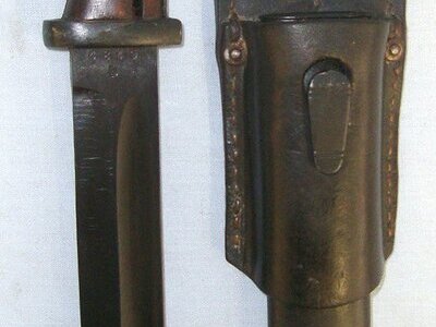 UN-ISSUED CONDITION**WW2 1943 Nazi German Army fnj (Alexander Coppel GmbH Alcoso, Solingen) Model 1884 / 98 3rd Model K98 Mauser Rifle Bayonet With Wood Grips , Mundlos 1939 Scabbard & 1942 Leather Frog By Erseltus Leipzig. Sn 22884 Bayonet
