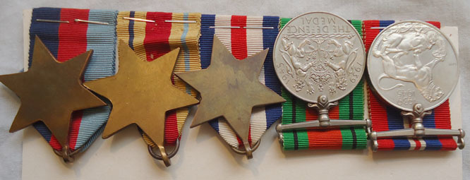  5 Medal Group comprising; The War Medal, Defence medal, France and Germany Star, Medal Group comprising; The War Medal, Defence medal, France and Germany Star, A Other Accessory
