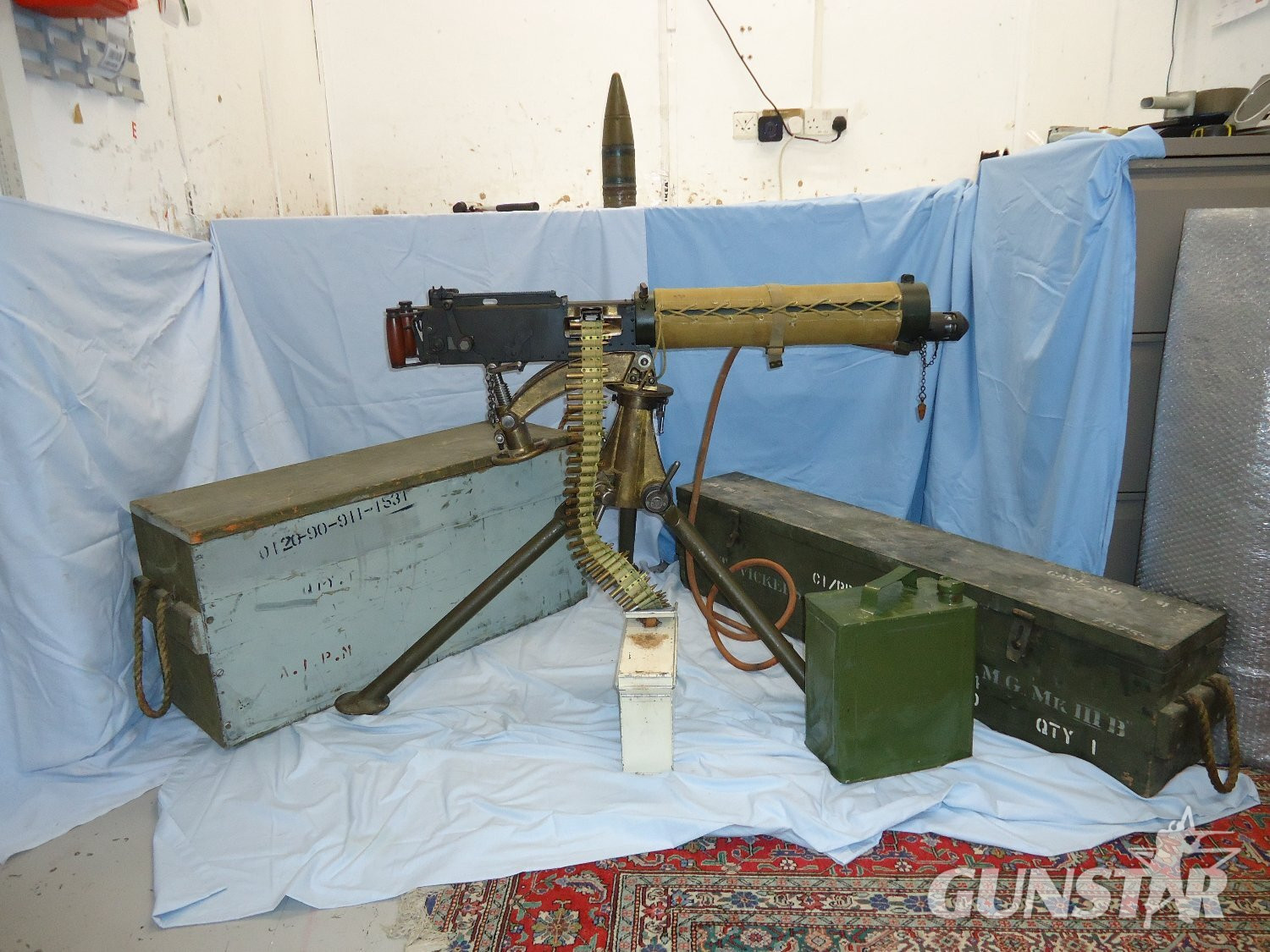 Vickers .303 Calibre Heavy Machine Gun, Linlithgow Manufacture in 1944, MK IV Cradle/Pintle By RH & S, Tripod, Condenser Tin. Condenser Adaptor, Hose, Ammunition Tin and Inert rounds in a Webbing Belt & Wooden Transit Boxes. **EARLY UK 1995 DEACTIVATION C Vickers .303 Calibre Heavy Machine Gun, Linlithgow Manufacture in 1944, MK IV Cradle/Pintle By RH & S, Tripod, Condenser Tin. Condenser Adaptor, Hose, Ammunition Tin and Inert rounds in a Webbing Belt & Wooden Transit Boxes. **EARLY UK 1995 DEACTIVATION C Various  Machine Gun - {CATEGORY} in 