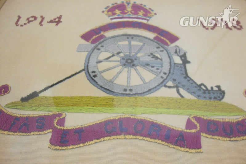 A Framed Embroidered Royal Regiment of Artillery Emblem and Motto commemorating the 1st World War. PI 129. A Framed Embroidered Royal Regiment of Artillery Emblem and Motto commemorating the 1st World War. PI 129. Antique & Militaria