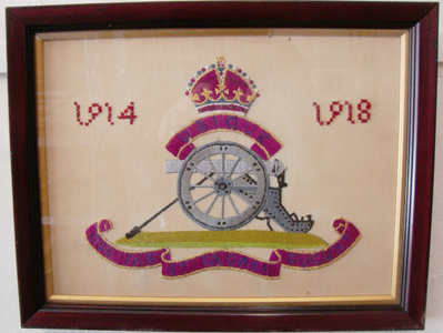 A Framed Embroidered Royal Regiment of Artillery Emblem and Motto commemorating the 1st World War. PI 129. A Framed Embroidered Royal Regiment of Artillery Emblem and Motto commemorating the 1st World War. PI 129. Antique & Militaria