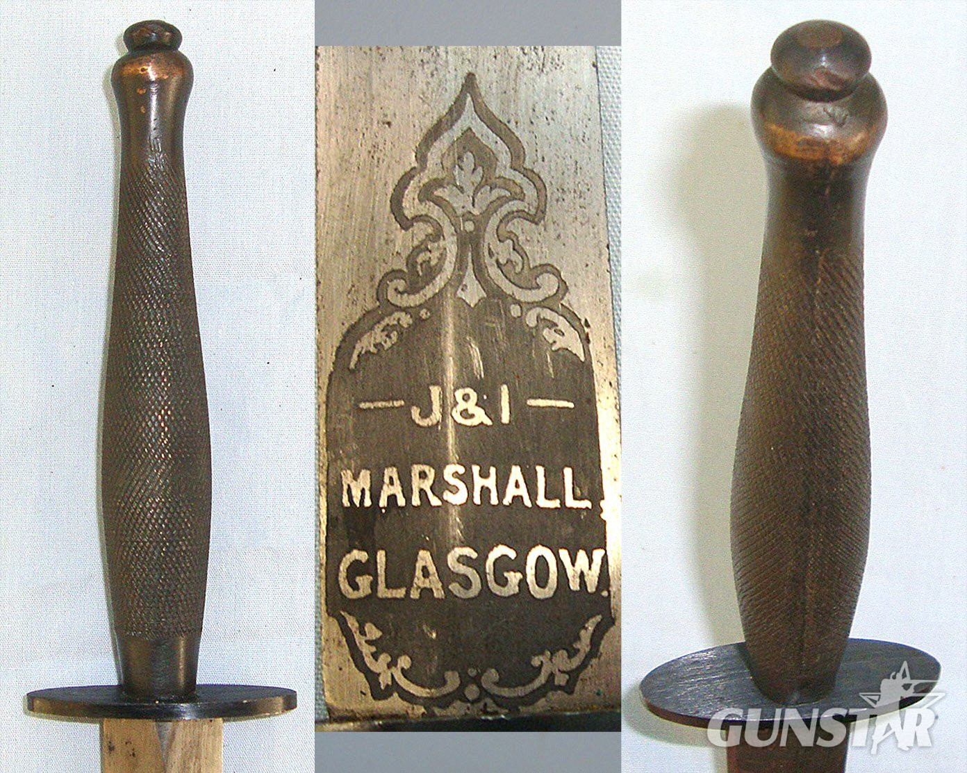 ONE OF THE RAREST**WW2 British 2nd Pattern Fairbairn Sykes FS Commando Fighting Knife By Wilkinson Retailed By J & I Marshall Glasgow Scotland With Etched Panel And Hand Drawn Blade Complete With Scabbard. Sn 23579 Knive