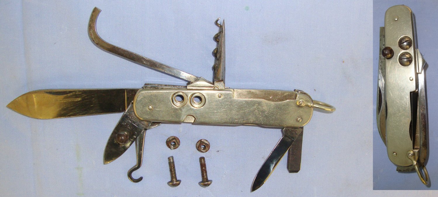  NAMED**WW1 Era British George Butler & Co Sheffield Royal Field Artillery (RFA) Officer’s / Cavalry Horseman\'s Folding Multi Tool Clasp Knife With Removable Rein Studs Engraved To ‘Lieutenant G.C. White RFA’. Sn 22903 Knive