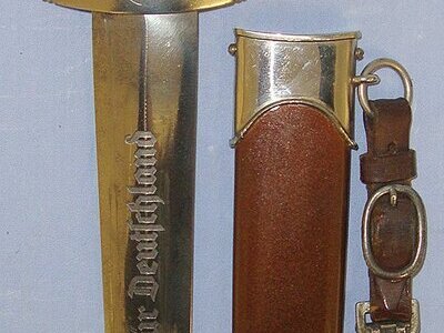 WW2 Production Nazi German 1933 Pattern SA Dagger By RZM M7/49 (F.A. Herder & Sohn Solingen (Rarity Value 4) With Scabbard, Leather Hanger Stamped ‘RZM M5/71 & OLC Cartouche Clip (Overhoff & Cie Lüdenscheid). Sn 23174:32 Dagger
