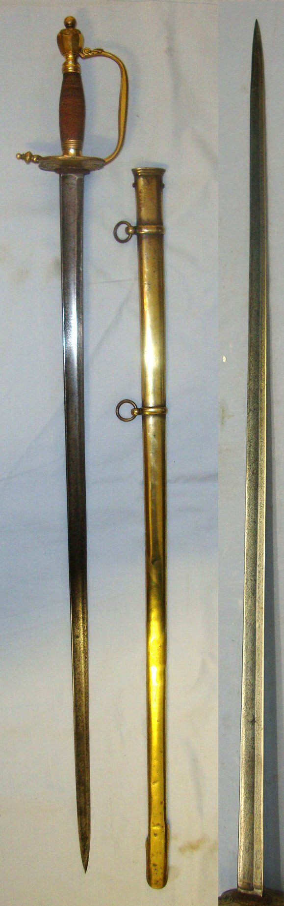  NAPOLEONIC WARS ERA**EARLY VARIANT RIGID GUARD**British John Salter London (Maker To Lord Admiral Horatio Nelson) 1796 Pattern Royal Marine’s Officers Sword With Blue & Gilt Etched Heraldic Arms Fighting Blade & Period Brass Naval Pattern Scabbard. ED 2 Sword