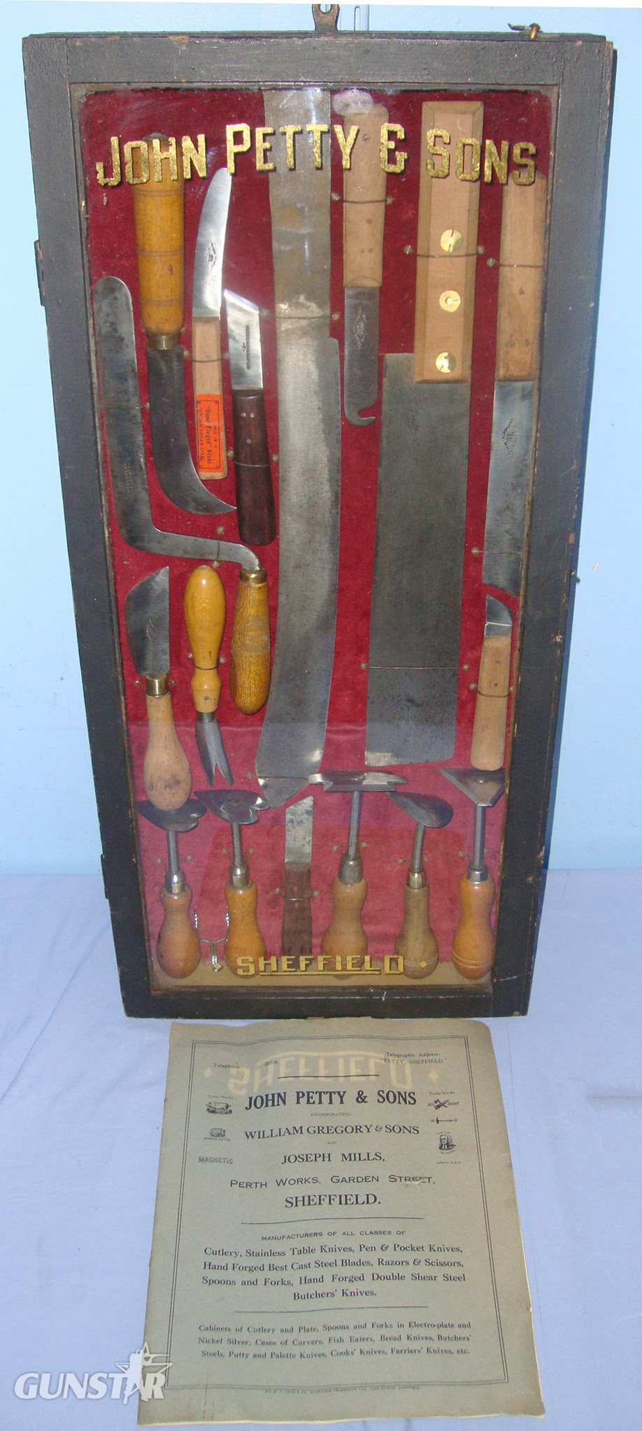 C1930’s Cased Iron Mongers / Cutlers Shop Window Display Of Various Knives & Tools For John Petty & Sons Sheffield With Original Illustrated John Petty & Sons Incorporating William Gregory & Sons, Joseph Mills, Trade Catalogue & Argyle Trade Leaflet. Knive in 