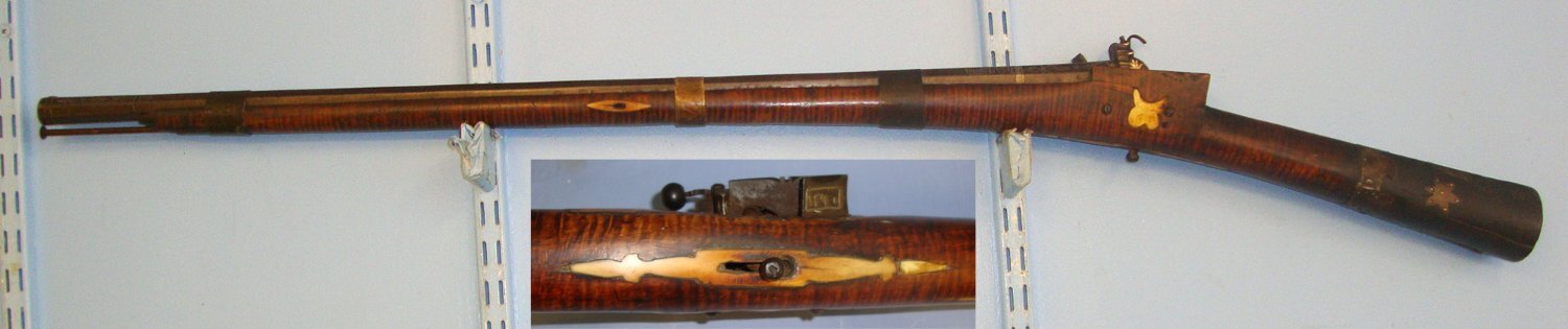  19th Century Ottoman Empire 24 Bore Miquelet Lock Rifle With Octagonal Barrel, Tiger Stripe Olive Or Palm Wood Stock, Silvered Hand Tooled Decoration, Action & Barrel Arabic Gunsmith / Family Signatures & Ram Rod. Sn 15226 Muzzleloader None Rifle