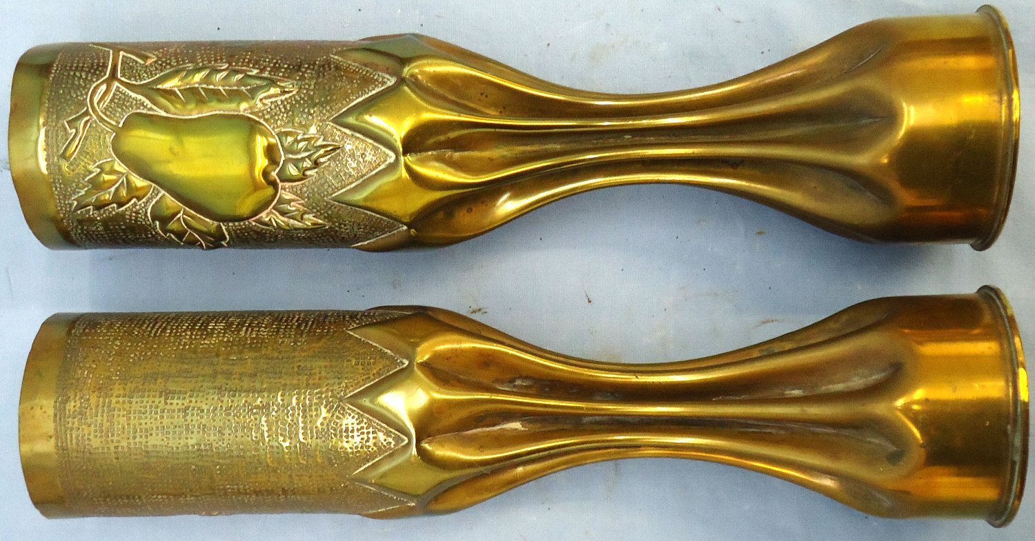 INERT DEACTIVATED. WW1, 1917 Dated, Mirrored Pair of Trench Art French 75mm Brass Cartridges Cases Decorated With Pears, Leave & Branches. Sn - 21612 INERT DEACTIVATED. WW1, 1917 Dated, Mirrored Pair of Trench Art French 75mm Brass Cartridges Cases Decorated With Pears, Leave & Branches. Sn - 21612  Other Ammunition - {CATEGORY}